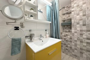 Hair dryer, towels, soap, toilet paper