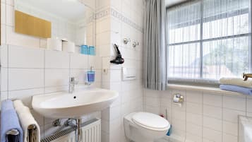 Shower, free toiletries, hair dryer, towels