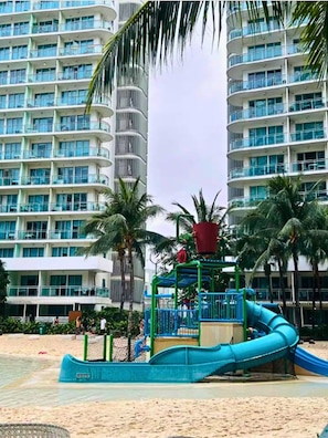 Private beach, white sand, sun loungers, beach umbrellas