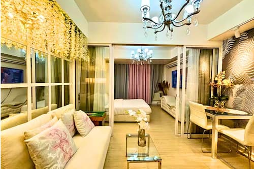 Deluxe suite, uitzicht op de stad | Woonruimte