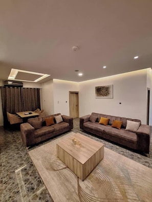 Deluxe Apartment, Balcony, City View | Living area