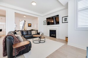 TV, fireplace - Family-Ready 4BR | Close to Trails, Shops & More (Oakville)