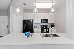 Fridge, microwave, oven, dishwasher - Modern 3BR Condo at Vista Cay – Near Disney (Orlando)