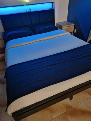 1 bedroom, desk, iron/ironing board, bed sheets