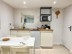 Fridge, microwave, toaster, cookware/dishes/utensils