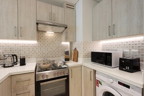 Fridge, microwave, oven, stovetop