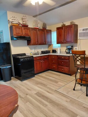 Private kitchen - Cozy Cabin (SUNRISE BEACH,)