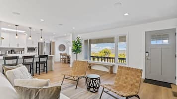 House | Living room | 80-inch Smart TV with cable channels