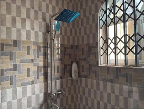 Shower, eco-friendly toiletries, hair dryer, soap