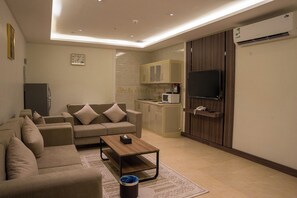 Economy Apartment, 2 Bedrooms, Housekeeping, City View | Living area
