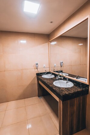 Deluxe Triple Room, Park View | Bathroom | Hair dryer, towels, soap, shampoo