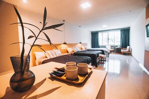 Deluxe Triple Room, Park View | Minibar, in-room safe, iron/ironing board, free WiFi