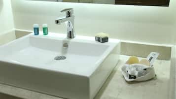 Shower, towels, soap, toilet paper