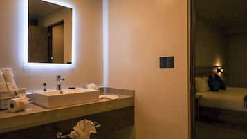 Shower, towels, soap, toilet paper