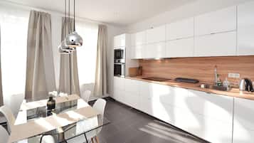 Bloc d'apartaments Deluxe, vistes al pati | Cuina privada