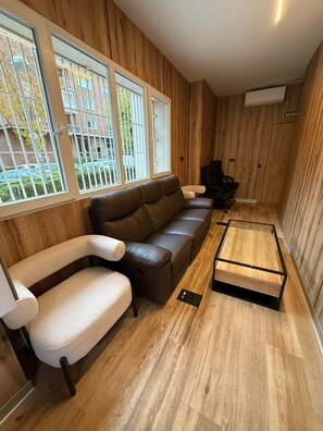 Deluxe Shared Dormitory | Living area | 72-inch LED TV with digital channels