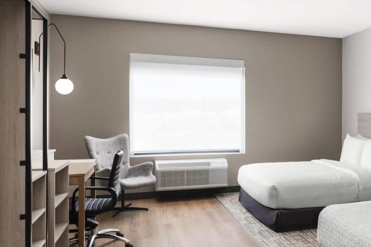 Desk, laptop workspace, blackout curtains, iron/ironing board