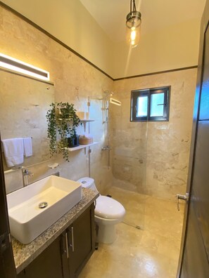 Shower, hair dryer, towels, soap
