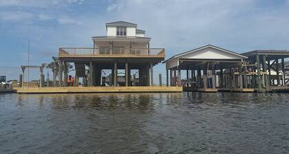 4 bed 4 bath waterfront camp in Cocodrie, LA - Perfect for fishing, Family & Fun