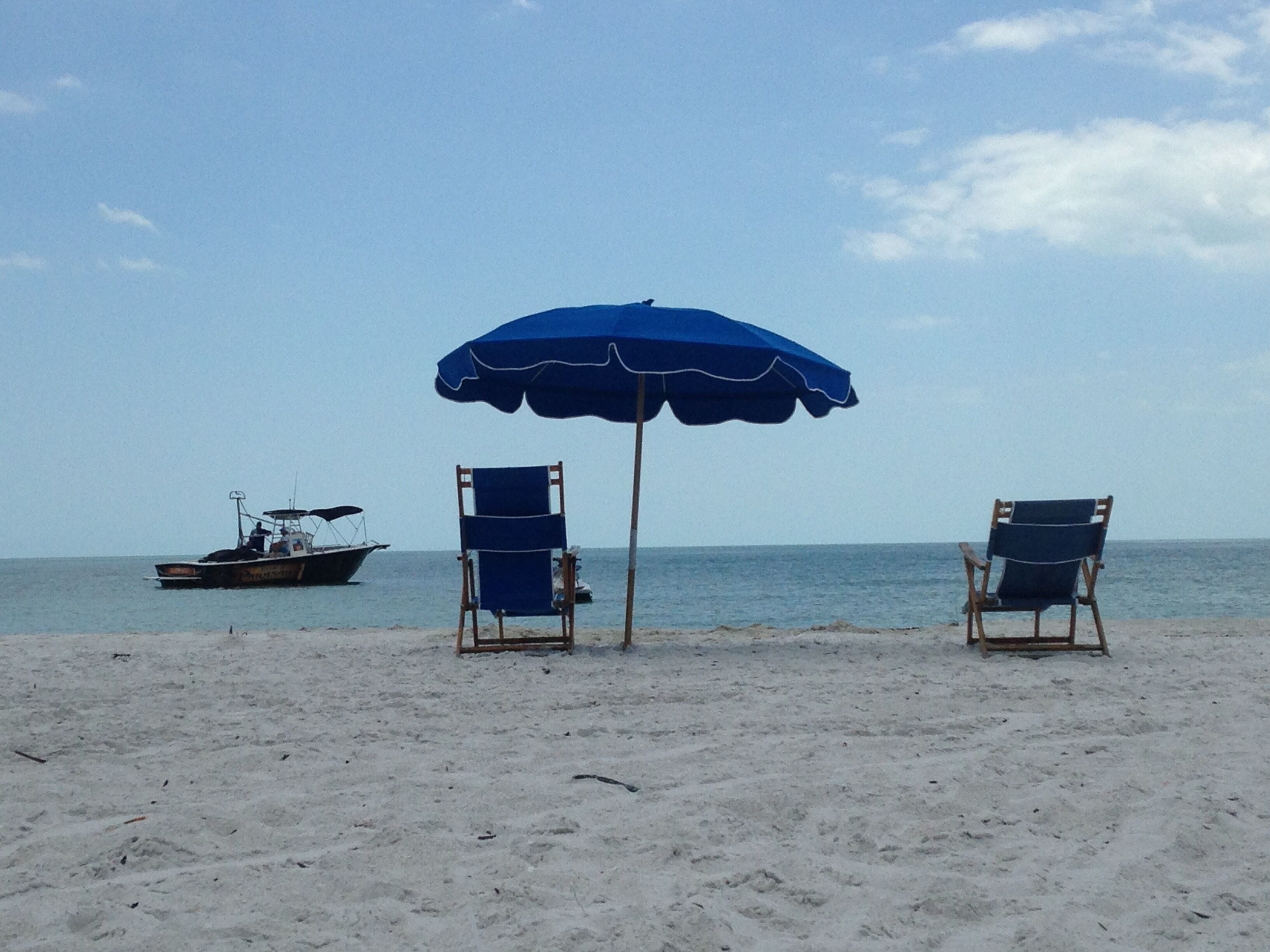 On the beach, sun loungers, beach towels