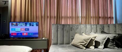 Chambre Triple, vue ville | Wi-Fi gratuit