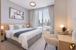 Appartement luxueux, balcon, vue sur la ville | Lit de bébé (supplément), accès au Wi-Fi (inclus), literie fournie