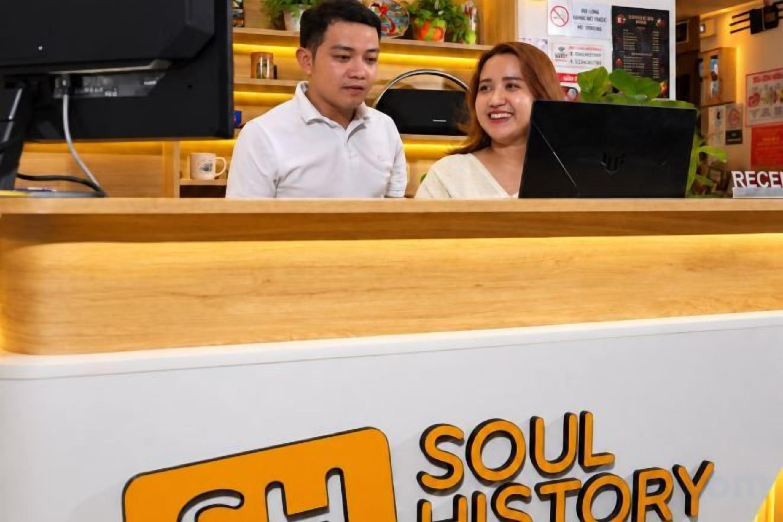 A reception desk with a sign that reads 'SOUL HISTORY'.