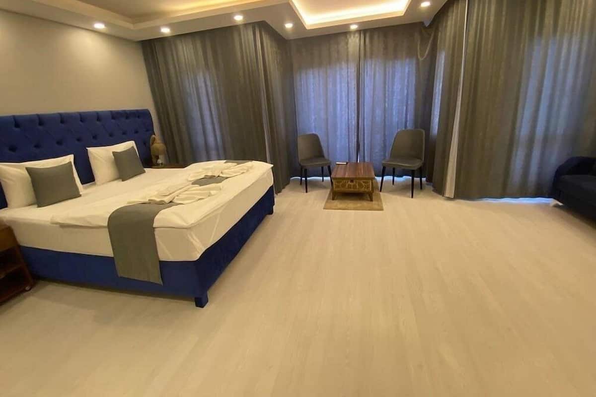 Deluxe Studio Suite, Balcony, City View | Desk, laptop workspace, soundproofing, iron/ironing board