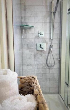 Hair dryer, towels, soap, shampoo