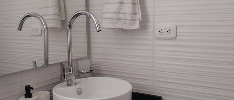 Shower, towels, toilet paper