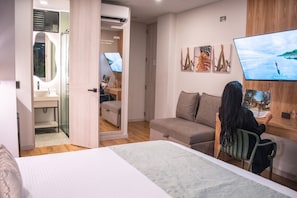 Quarto superior | Frigobar, cofres nos quartos, escrivaninha