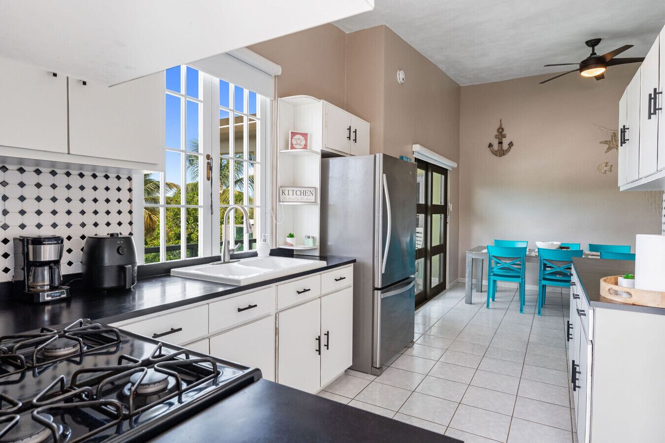 Fridge, microwave, stovetop, coffee/tea maker