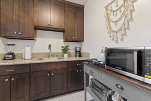 Fridge, stovetop, cookware/dishes/utensils