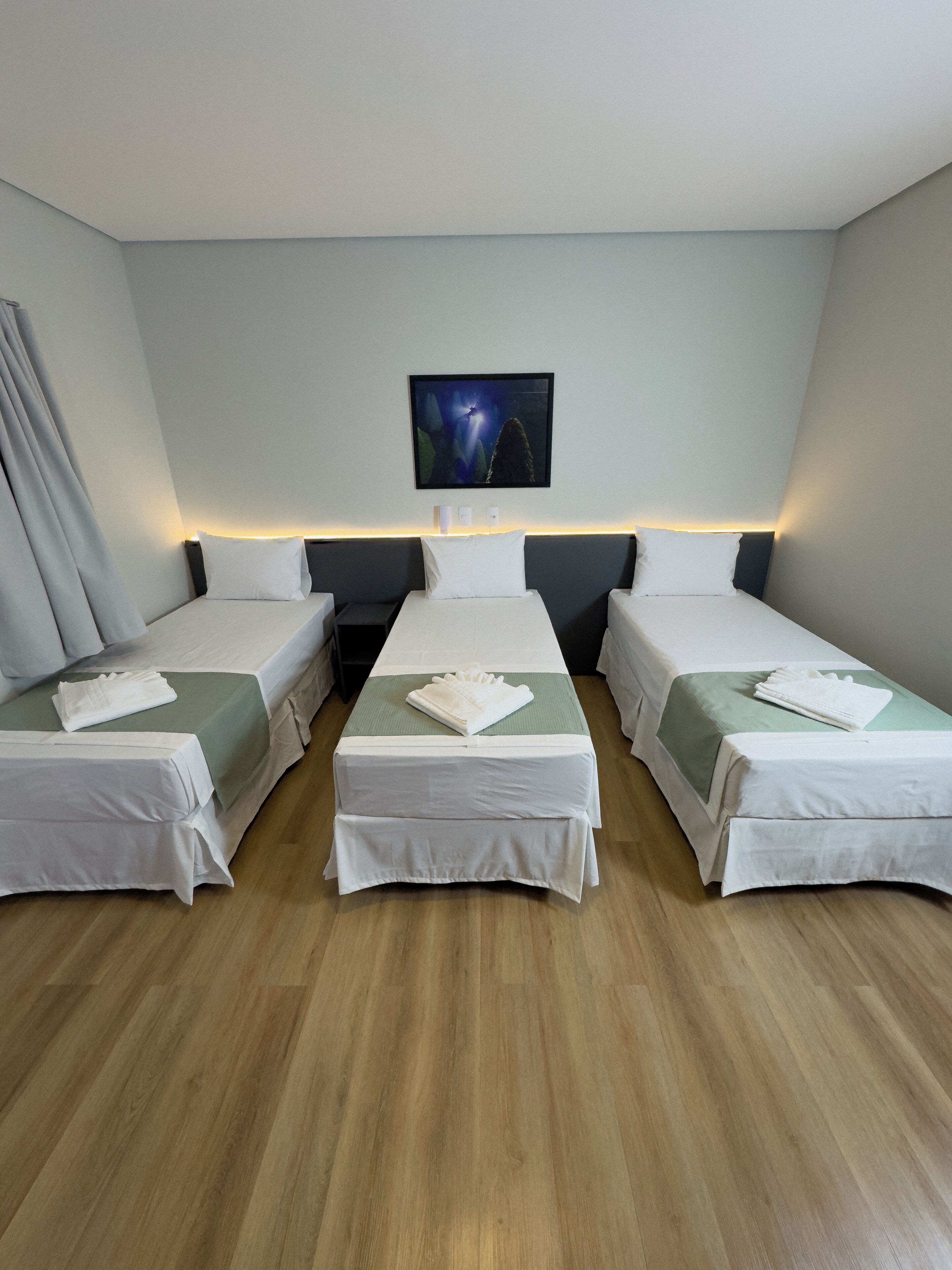 Kolmen hengen executive-huone | Ilmainen Wi-Fi, vuodevaatteet