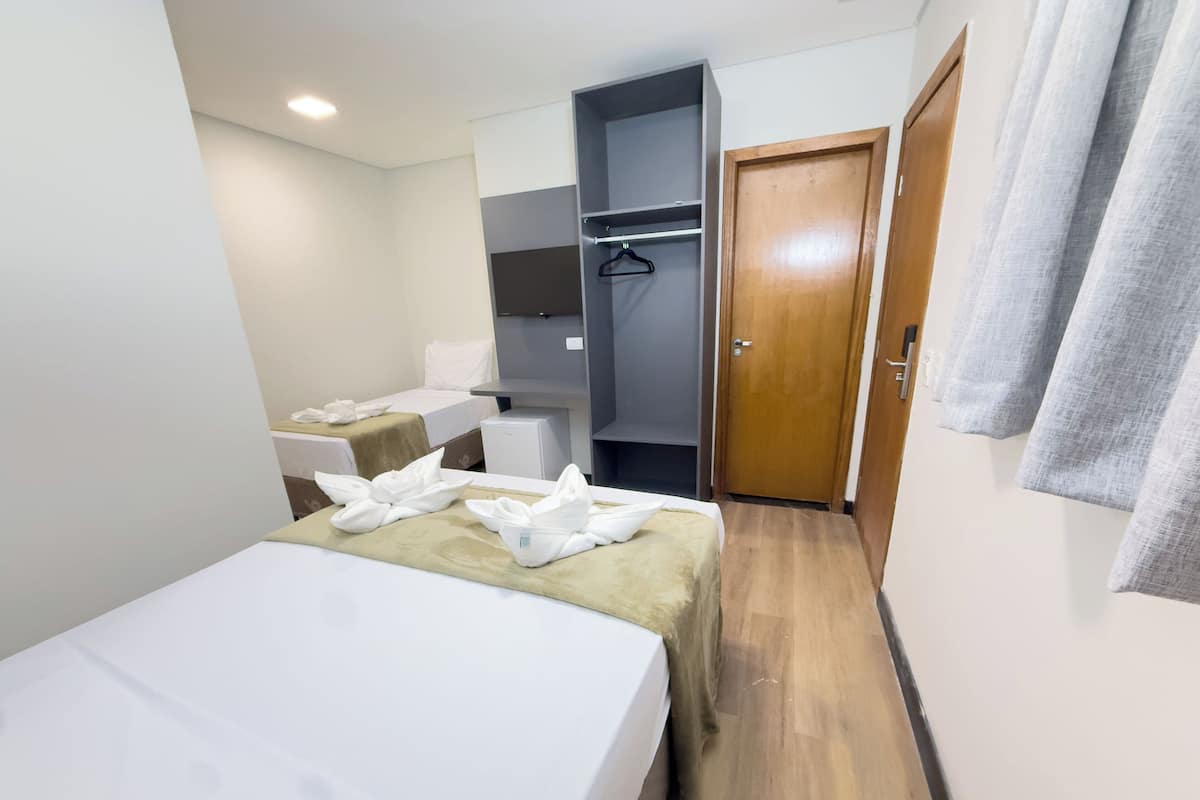 Habitación triple ejecutiva | Wifi gratis y ropa de cama