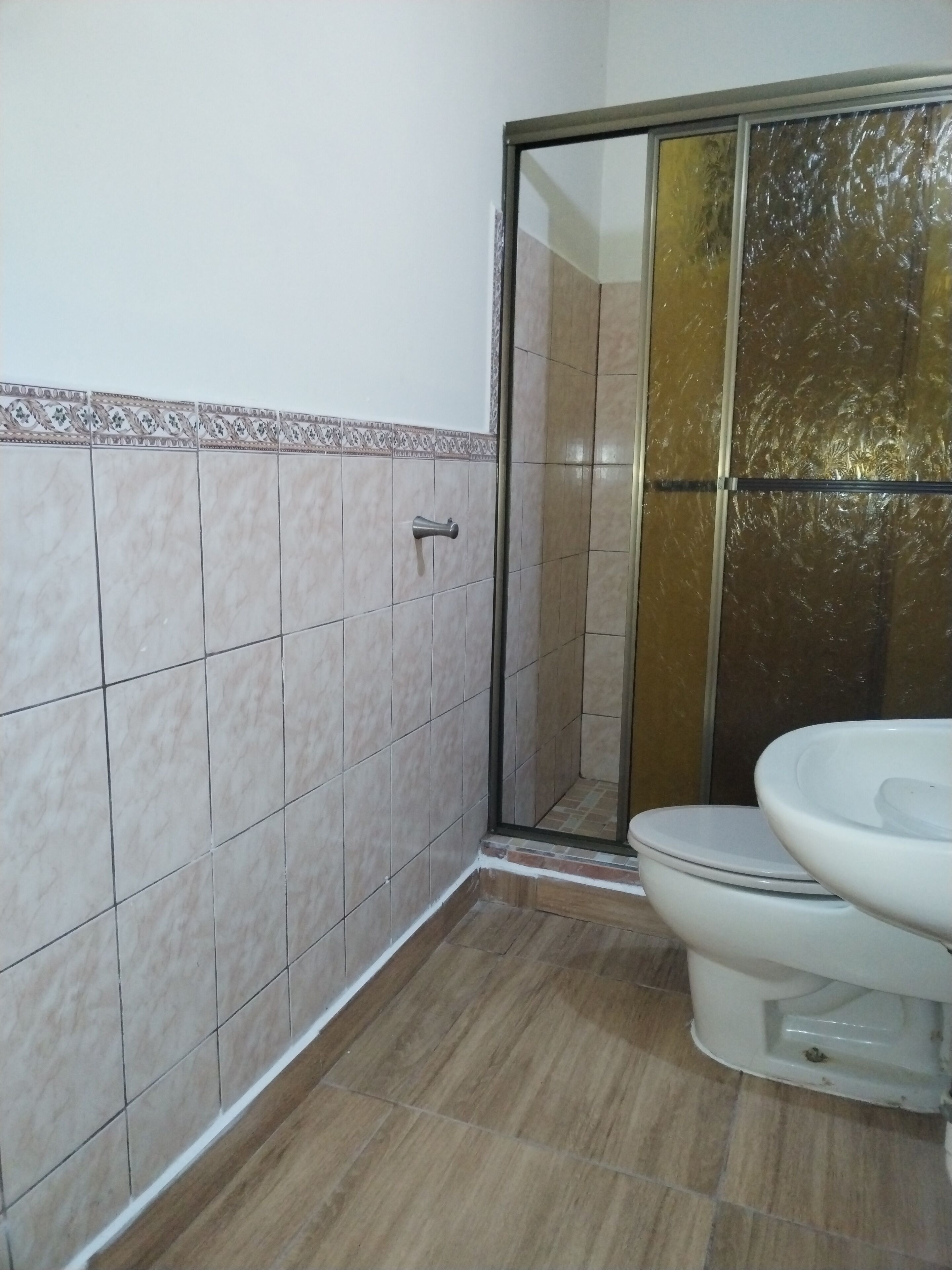 Habitación cuádruple familiar, patio, vista al jardín | Espacio para trabajar con laptop y wifi gratis 