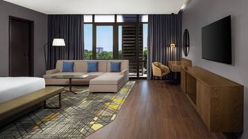 Suite ejecutiva, 1 cama de matrimonio grande, vistas a la ciudad | Cortinas opacas y sistema de insonorización