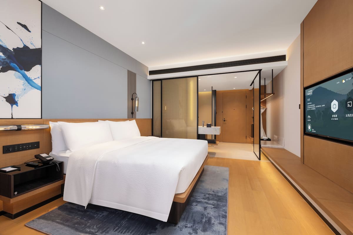 Couette en duvet d'oie, surmatelas, articles gratuits dans le mini-bar