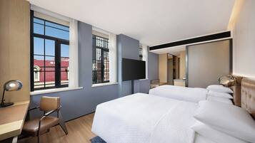 Premium bedding, free minibar, in-room safe, individually decorated