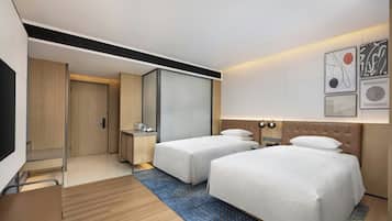 Premium bedding, free minibar, in-room safe, individually decorated