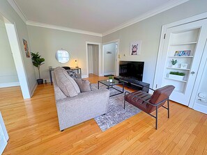 Comfort Apartment, 1 Queen Bed | Living area | 55-inch TV with digital channels, streaming services - Charming 1BR in Evanston - Hinman B3 (Evanston)
