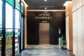 An elevator entrance with a sign reading 'LIFTSTO TOWER B&C'. - Inap II, Suterabay by Ayuhouz (Kota Kinabalu)