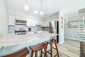 Fridge, microwave, oven, stovetop - Spacious Waterfront Condo | Cotton Bayou 3E | Outdoor Pool | My Beach Getaways (Orange Beach)