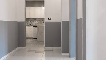 Departamento, vista a la ciudad | Área de sala de estar | Televisión