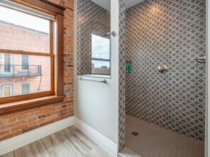 Shower, hair dryer, towels, soap - Downtown Luxury Loft, 13-Ft Ceilings, Walkable (Kalamazoo)