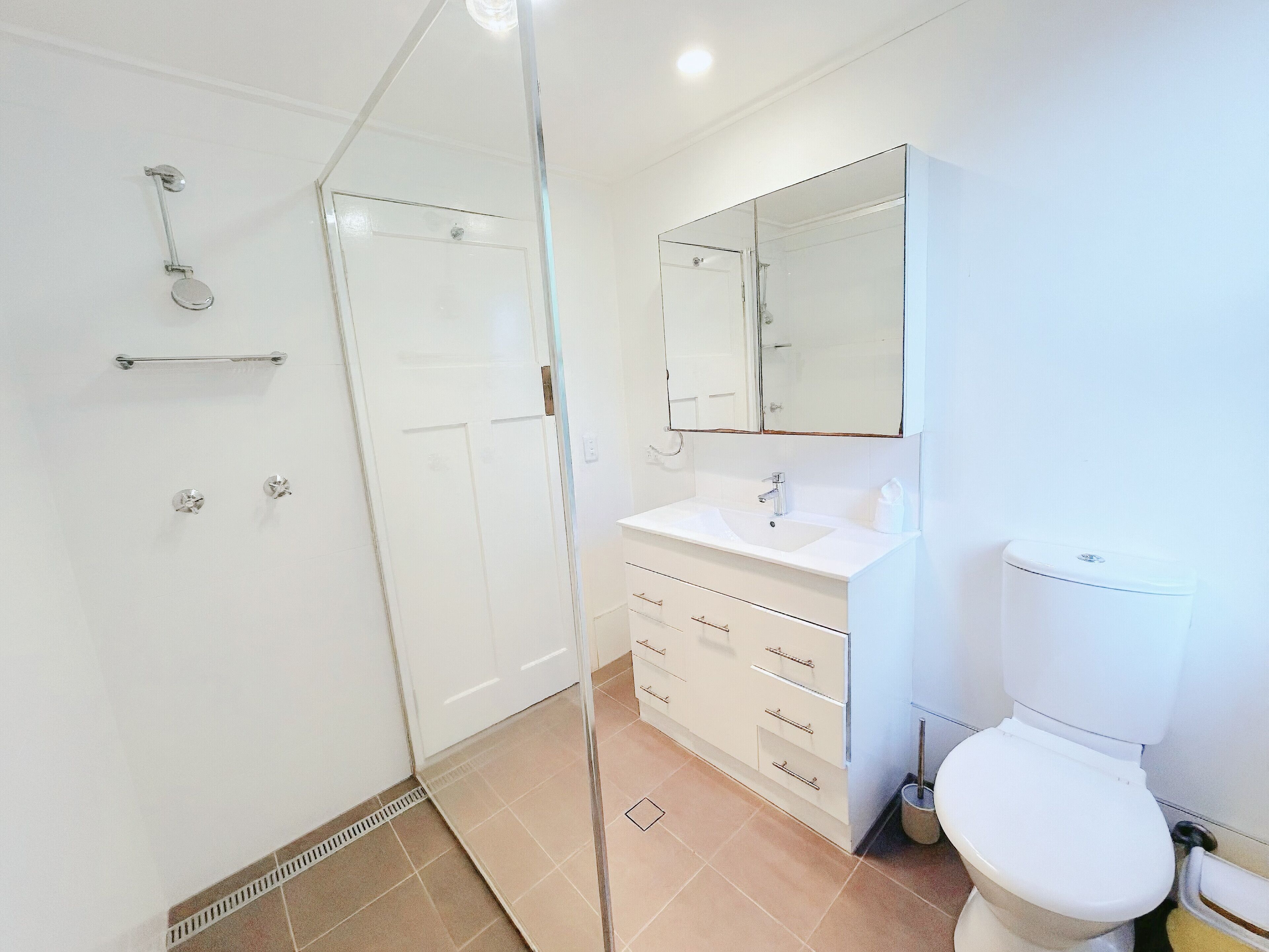 Shower, hair dryer, towels, shampoo