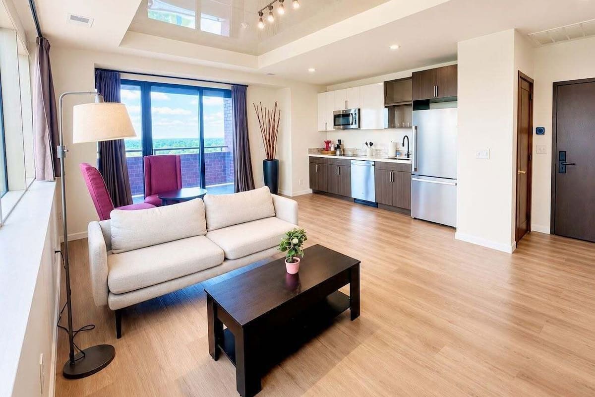 City Apartment, City View | Living area | 50-inch TV with digital channels, streaming services
