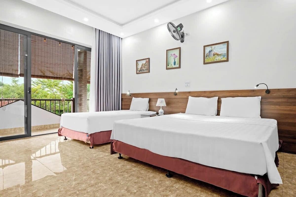 Standard Triple Room, Garden View | Desk, laptop workspace, blackout drapes, soundproofing