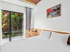 Standard Double Room, Garden View | Desk, laptop workspace, blackout drapes, soundproofing