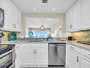 Fridge, microwave, oven, stovetop - BayviewBliss - Sandestin 2BD Bay Views + Golf Cart (Miramar Beach)